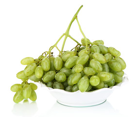 Ripe green grapes on plate isolated on white