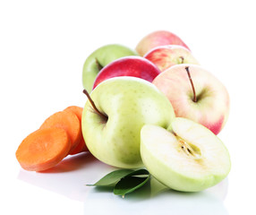 Sweet apples and carrots isolated on white