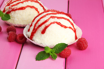 Delicious coconut cakes on table close-up