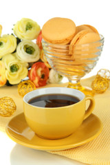 Coffee and macaroons isolated on white