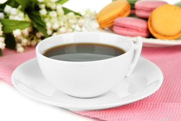 Coffee and macaroons close-up