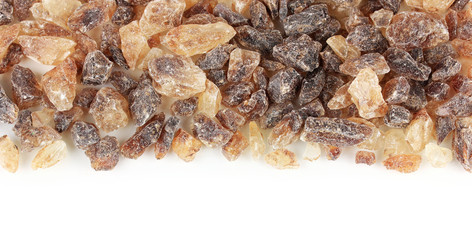 Caramelized sugar on white background
