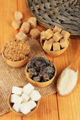 Different types of sugar on table close-up