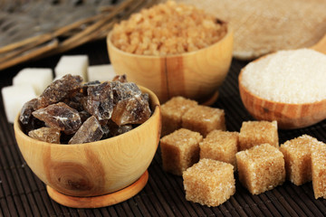 Different types of sugar on table close-up