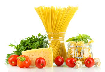 Different types pasta with vegetables isolated on white
