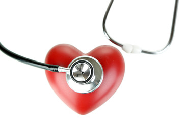 Stethoscope and heart isolated on white