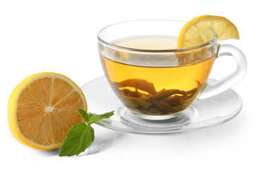 Transparent cup of green tea with lemon and mint isolated