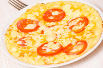 omelette with tomatoes, cheese