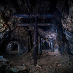 wooden pillars in the old mine, catacombs