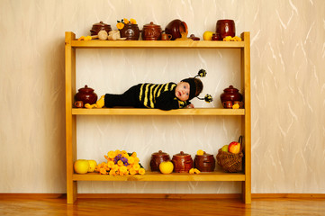 little funny baby with bee costume