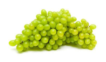 bunch of ripe and juicy green grapes close-up on a white backgro