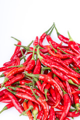 red Cayenne pepper on white