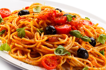Pasta with meat, tomato sauce, parmesan and vegetables