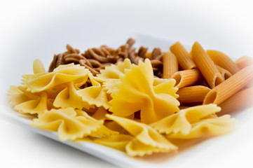 different organic pasta types in a bowl