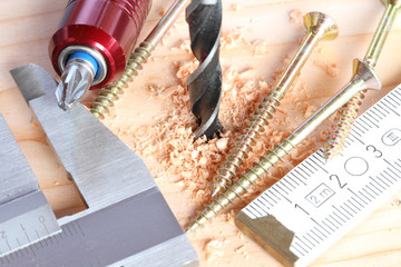 Bohrer mit Zollstock