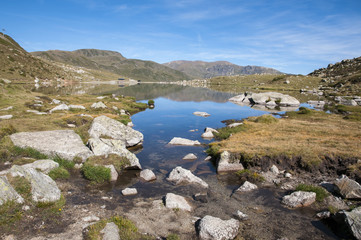 Fototapeta premium Landscape of a lake in the high mountains