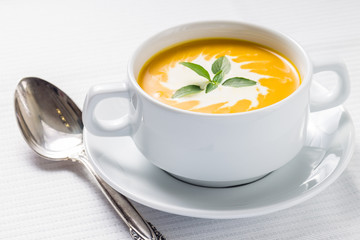 Pumpkin soup on served table