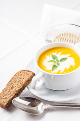 Pumpkin soup on served table