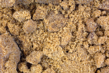 A very close view of dark brown sugar