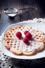 Sweet and delicious waffles with fruits