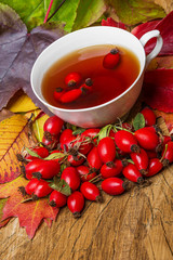 rosehip tea and autumn leaves