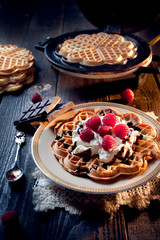 Sweet and delicious waffles with fruits