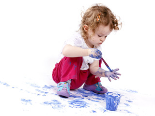 Little baby artist with watercolors