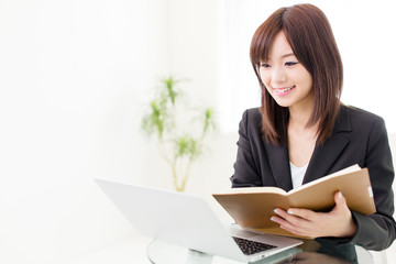 Fototapeta premium young asian businesswoman working