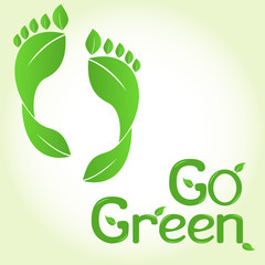Go green concept with human footprints of leaves