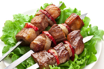 Grilled kebab (shashlik) on spits.