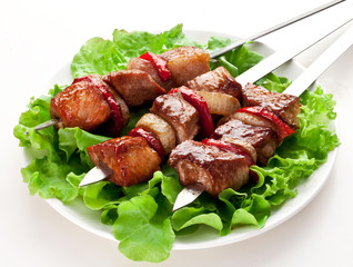 Grilled kebab (shashlik) on spits.
