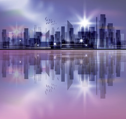 Obraz na płótnie Canvas City skyline at night with reflection in water