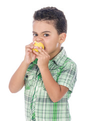 Little Hungry Boy Eating Fruit