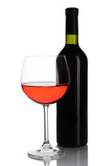 Red wine glass and bottle of wine isolated on white
