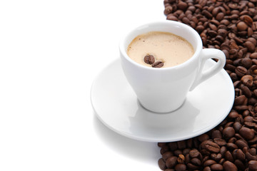 Cup of coffee with coffee beans, isolated on white