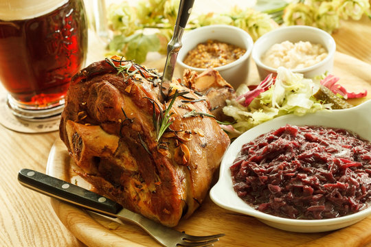 eisbein with braised cabbage, mashed potato, and beer