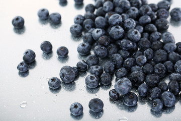 Blueberries on metal background