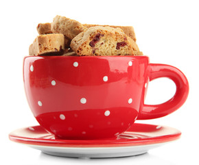 Tasty cookies in cup isolated on white