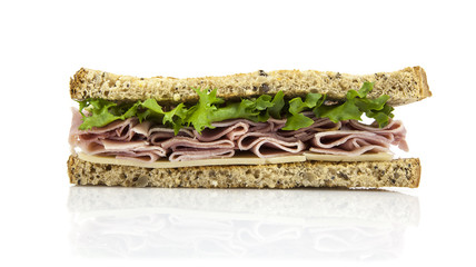 Fresh cut sandwich with ham, cheese and salad