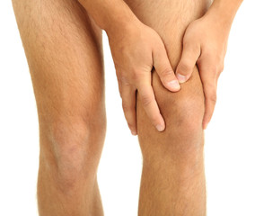 Young man with knee pain, isolated on white