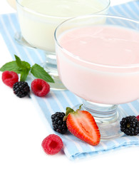 Delicious yogurt with berries isolated on white