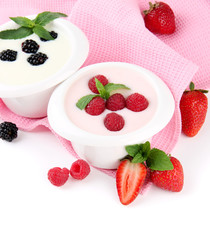 Delicious yogurt with berries isolated on white