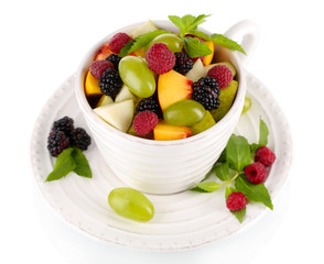 Fruit salad in cup isolated on white