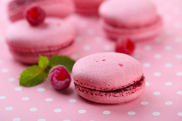 Gentle macaroons on table close-up