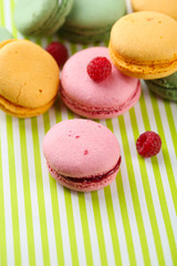 Gentle macaroons on table close-up