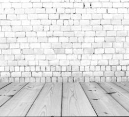 Old brick wall on wood floor