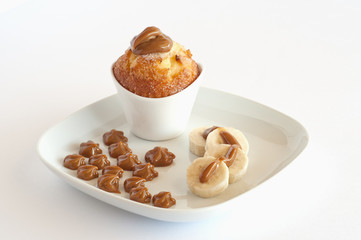 Caramel desserts over a white background..
