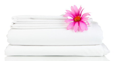 Stack of clean bedding sheets isolated on white