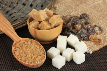 Different types of sugar on table close-up