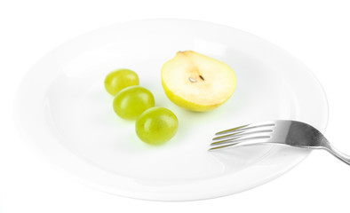 Small portion of food on big plate isolated on white